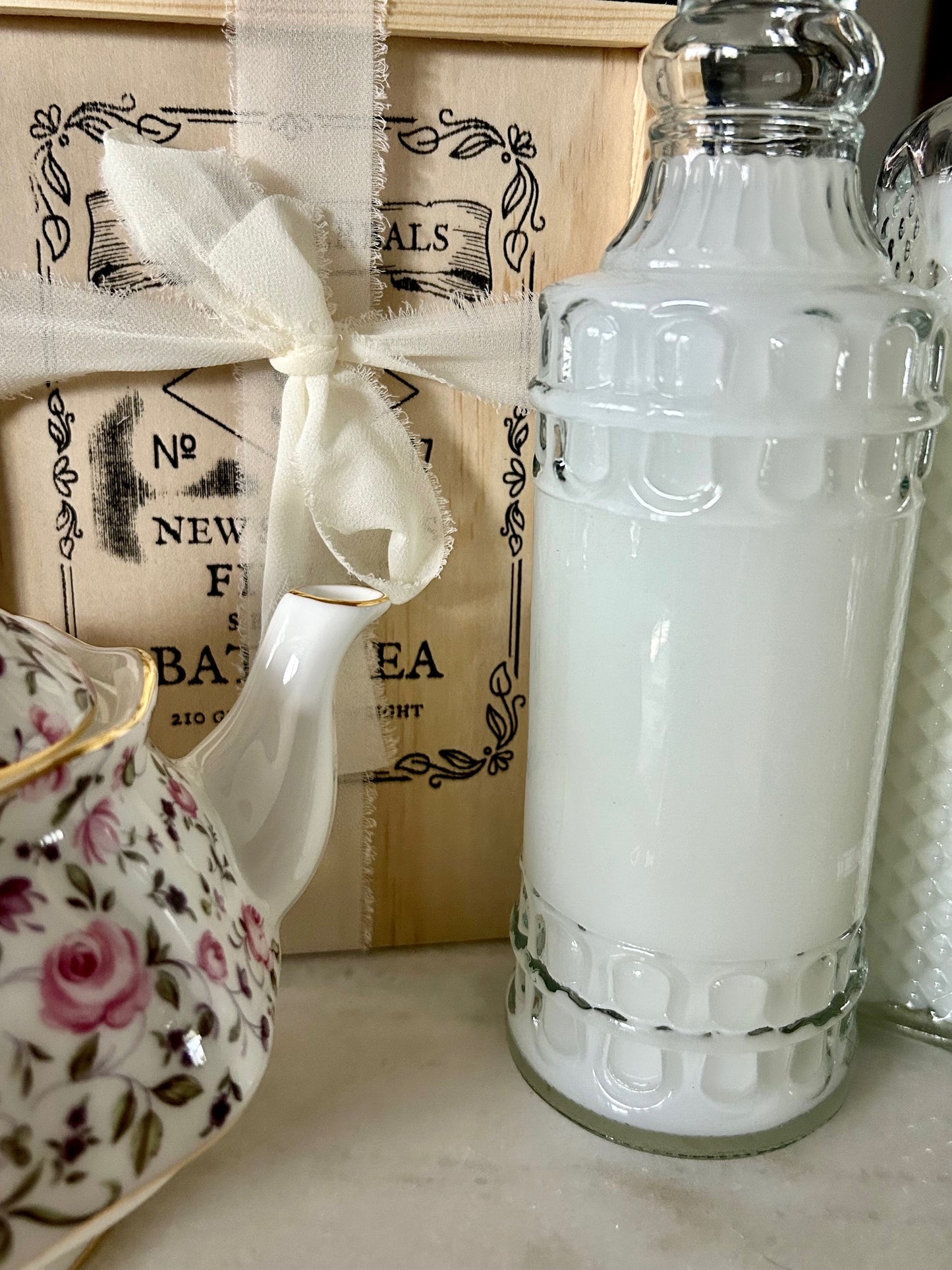 Hand-crafted Victorian romantic-inspired bath tea in a vintage style crate, stamped and tied with a white ribbon. 